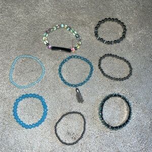 bundle of blue and silver beaded bracelets. stretchy and NWOT